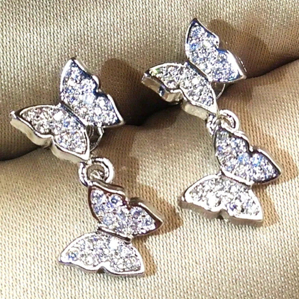 WHITE GOLD / STERLING DOUBLE BUTTERFLY/WHITE TOPAZ DANGLE 1 1/2 IN